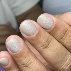 A beautiful glittery gel overlay on natural nails. This is a great option for nail biters or anyone looking to strengthen and grow their own nails.