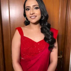 The prettiest bride-to-be, ready for a Diwali party. I gave her a glamorous look with a smokey eye and a bold red saree.