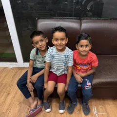 A group of happy little clients showing off their fresh cuts. I aim to make every child's visit a positive one.