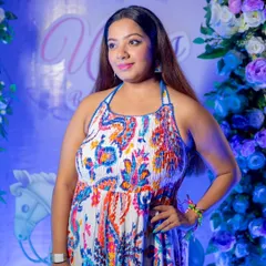 Posing at a beautifully decorated baby shower. I work with families to conceptualize games and activities that are unique to their celebration, making it a truly personalized experience.