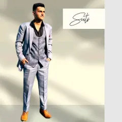 Our client makes a statement in this sharp grey three-piece suit paired with a black shirt. A modern and stylish choice for any formal event.