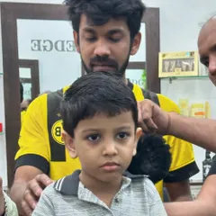Even my youngest patrons get the full professional treatment. I take extra care to make sure kids are comfortable and happy during their haircut.