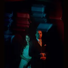 A multi-exposure creative shot, layering their portraits to convey the idea of two souls finding each other.