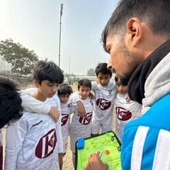 It's not just about running hard; it's about playing smart. Here, one of our AIFF licensed coaches breaks down game tactics and formations for the U13 elite team. We build football IQ from day one.