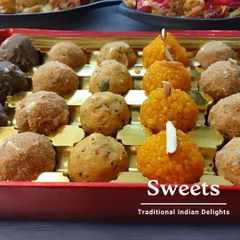 Our traditional Indian delights are perfect for gifting. This box is filled with a variety of our homemade laddoos, each with its own unique flavour and texture.