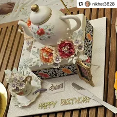 A closer look at the exquisite teapot cake created for Aamir Khan's mother. The design features a hand-painted floral pattern on the teapot and a delicate sugar teacup, all inspired by her personal style.