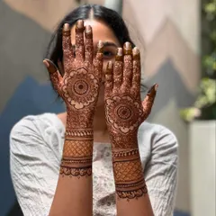 A lovely shot of a semi-bridal mandala design after the henna paste has been removed. The rich stain highlights the intricate details of the pattern.
