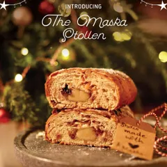 Introducing our Maska Christmas Stollen. This traditional German Christmas bread is dense, moist, and generously studded with rum-soaked fruits and nuts, with a house-made almond marzipan center.