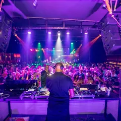From behind the decks at Goa Sunsplash, looking out at a sea of people. This is my element, controlling the energy of a massive festival crowd and taking them on a journey through sound.