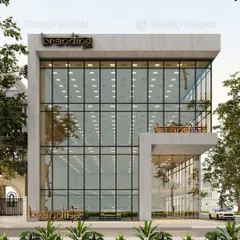 The front elevation of the 436 sq. yard commercial building in Janakpuri. This view highlights the impressive scale of the glass facade, designed to maximize visibility and create a bright, open interior for the businesses within.