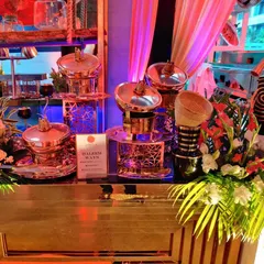 A close-up of our 'Haleem Ways' station, showcasing the beautiful copper serving pots and intricate stands. This setup is perfect for serving traditional Indian delicacies with a touch of royal elegance.