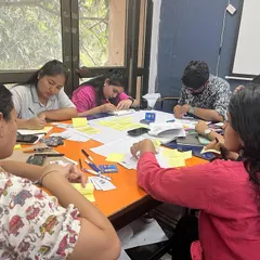 Another group of students deeply focused on the workshop task. These intensive sessions are designed to bridge the gap between academic theory and professional practice in heritage conservation.