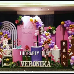 For Veronika's first birthday, I created this magical fairy angel theme. The decor features elegant pink and purple tones, fairy wing silhouettes, and soft lighting to bring a touch of enchantment to the celebration.