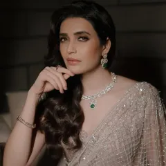 The stunning Karishma Tanna embodies modern sophistication in our diamond and emerald necklace set, a perfect choice for a high-fashion event.