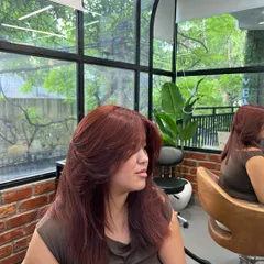 The butterfly haircut is all about creating volume and movement. The long, sweeping layers frame the face beautifully.