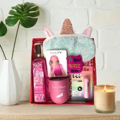 For the sister who loves all things cute and pink. This Rakhi hamper includes a unicorn eye mask, Skinn body mist, a scented candle, Sugar Pop lip balm, and fun, quirky accessories.