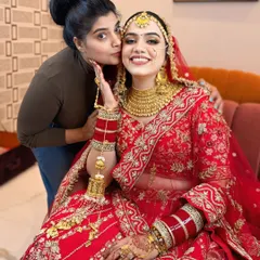 A happy hug from a happy bride. This is more than just a job for me; I build a connection with my brides to make their day special.