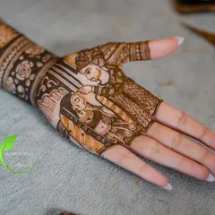 The moment a story comes to life. This detailed portrait captures the groom's loving gesture, a beautiful memory etched in henna.