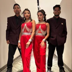 Here is a part of my talented team, ready to bring the energy to an event. Dressed in coordinated red and black outfits, we believe in looking as professional and sharp as our dance moves.