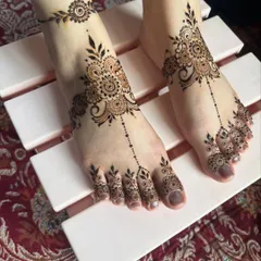 Another view of the delicate foot design, showing how it elegantly adorns the feet.