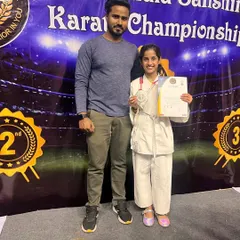 Another one of our dedicated students with her medal and certificate at the All India Sanshinkan Karate Championship. Her achievement is a testament to her hard work.