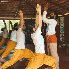 In Virabhadrasana I (Warrior I Pose), the goal is not just the shape but the feeling of strength and stability. I guide students to lift their hearts and ground through their feet, finding the balance between effort and ease. This is how we build a strong, intelligent practice.