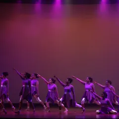 Our contemporary dance students performing a powerful piece in perfect unison. The dramatic lighting and matching costumes amplify the emotional impact of the choreography.