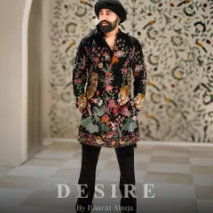 This is what it means to wear art. I designed this custom kurta with intricate floral and tiger motifs to create a look that is both regal and fierce. It is a statement of power, crafted for the man who is unafraid to stand out.