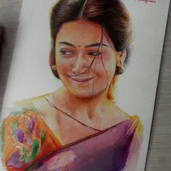 A colored pencil and pen portrait of Srivalli from the movie Pushpa. I used a mix of colors to capture the softness of her expression and the vibrant colors of her saree.