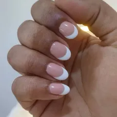 The clean lines and perfect curves of this classic French manicure on short, natural nails. This look is effortlessly chic and always in style.