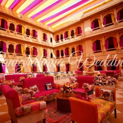 Another view of the palace courtyard Mehendi, showing the colorful seating arrangements and patchwork furniture that added to the Rajasthani vibe.