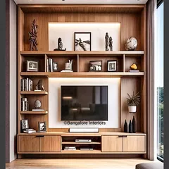 This floor-to-ceiling media unit is built around the TV, offering a library-like feel with extensive shelving for books and decor. The warm wood finish and integrated backlighting create a cozy and inviting atmosphere.