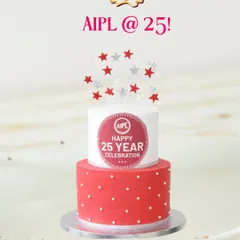 This two-tiered cake was created for AIPL's 25th silver jubilee. The design incorporates the company's red and white brand colors, a custom logo print, and celebratory star toppers.