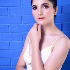 Working with actress Radha Bhatt, the goal was a clean, striking headshot. The bold blue background makes her expression pop, creating a professional and engaging portrait perfect for an actor's portfolio.