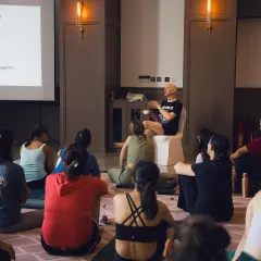 Eddie Stern sharing insights on the science of yoga and stress. Our workshops go beyond asana, offering deep dives into the philosophy and practical applications of the practice.