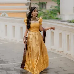 A candid walking shot, showing the beautiful movement of the gown. The makeup and hair are styled to look perfect from every angle.
