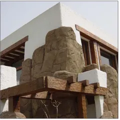 Embodying a river rock style in New Delhi, this private residence uses boulders and natural stone as a key exterior feature. This approach differentiates the home while gorgeously making it one with its surroundings.