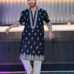 Our embroidered black kurta is perfect for festive nights out. The intricate threadwork on the neckline and cuffs adds a touch of elegance to the classic silhouette.