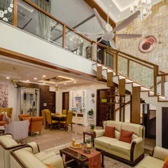 Another view of the penthouse from image 123, showing the scale of the living area and the staircase connecting the floors.