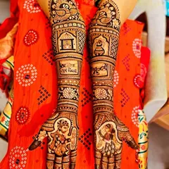 A complete bridal mehandi that combines everything: portraits of the bride and groom, traditional peacock figures, and auspicious symbols. I work with you to include personal touches that make your bridal henna unique.