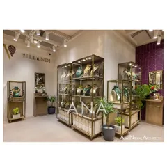 We created a luxurious and minimal exhibition space for Villandi Jewellers at Bridal Asia. The design uses an off-white palette with brass and wood accents, ensuring the intricate jewellery pieces remain the primary focus within the elegant display cases.