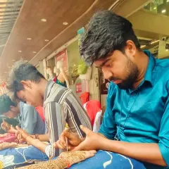 My team of professional artists working efficiently during a busy event. Having multiple artists means we can serve many guests at once, keeping the party moving.