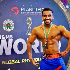 A proud moment for me on the Mr. & Ms. World Global Physique stage. Competing at this level requires extreme discipline in both training and nutrition, and I bring that same champion mindset to helping you achieve your own peak physical condition.