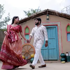 We bring an authentic desi vibe to life with our rustic village set. This pre-wedding shoot captures a candid moment against the backdrop of a traditional mud house, perfect for telling a story rooted in culture.