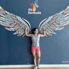 Spread your wings and find your strength. Our iconic angel wings wall is a favorite spot for members to capture their progress and celebrate their fitness journey.