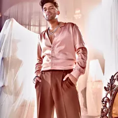 I designed this custom satin shirt for singer Guru Randhawa for his song 'Designer'. The fabric and fit were chosen to create a look of relaxed luxury.