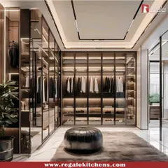For a bold and sophisticated look, we used dark framing and glass doors in this walk-in closet. The integrated LED lighting highlights the clothing and accessories, creating a dramatic and organized display.