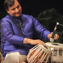 Lost in the rhythm during the Taal Chakra concert. The blue kurta adds a nice touch of colour to the stage.