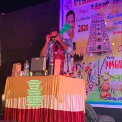 Performing on stage during a Pongal celebration. I customize my shows to fit the theme and energy of any cultural festival or corporate event, ensuring the entertainment feels right for the occasion.
