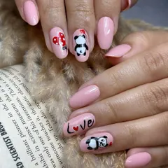 Cuteness overload with these custom hand-painted panda nails. Set on a soft pink base, this design features adorable pandas, hearts, and the word "Love," all meticulously painted for a playful and personal manicure.